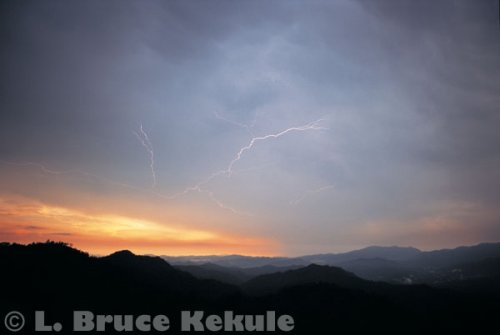 Lightning and sunset over the Phetchaburi River